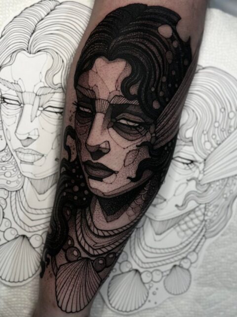 Blackwork siren tattoo done by Max LaCroix at Akara Arts in Milwaukee, WI