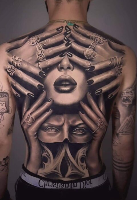 Back tattoo by ©️ Dani Ginzburg.